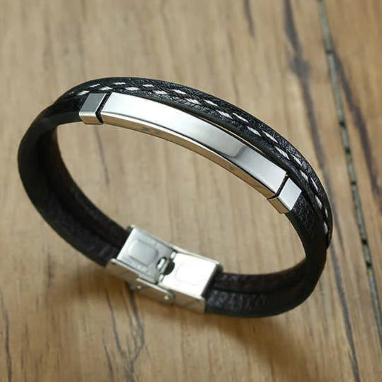 Bracelet en cuir tressé noir avec plaque en acier inoxydable, idéal pour un look élégant