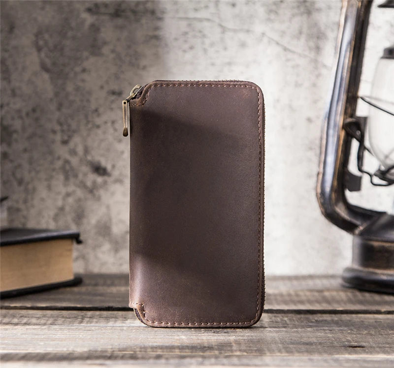 Pochette de rangement en cuir marron pour montres, design élégant et compact pour les passionnés d’horlogerie