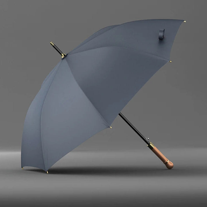 Parapluie bleu marine vintage avec manche droit, vue de profil, détail du design de luxe et du tissu imperméable