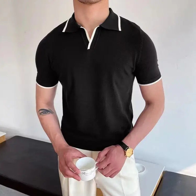 Polo homme noir en laine, coupe slim fit, élégance à l’anglaise et confort optimal.