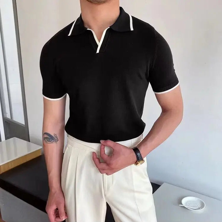 Polo homme noir en laine de qualité, coupe slim fit, élégance à l’anglaise et confort optimal.
