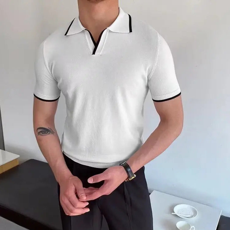 Polo homme blanc en laine, coupe slim fit, élégance à l’anglaise pour un look chic et raffiné.