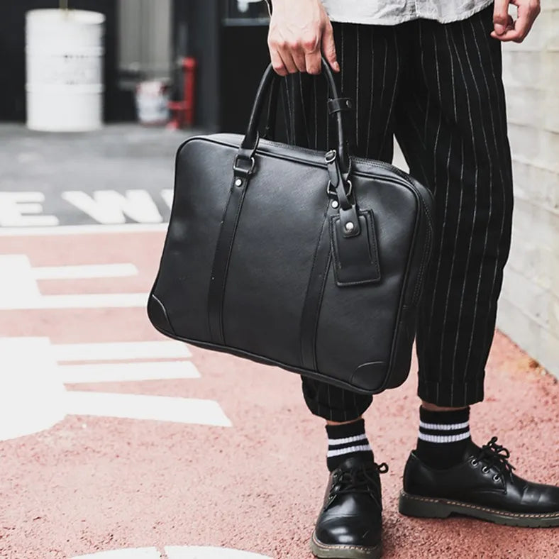 Porte-documents élégant en cuir noir, format 14 pouces, conçu pour un rangement efficace et structuré