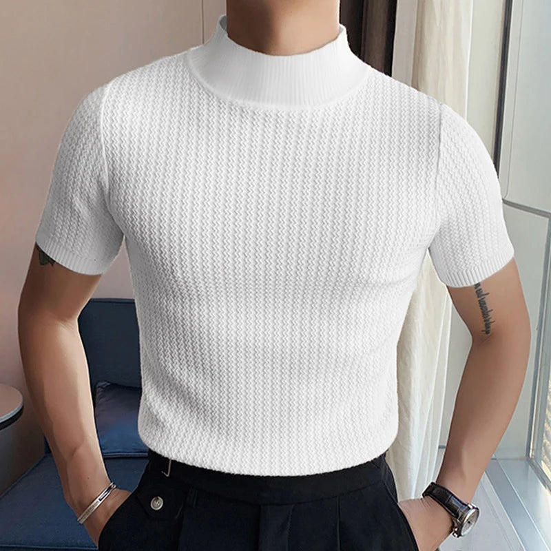 Pull en coton blanc ajusté, parfait pour une allure sophistiquée