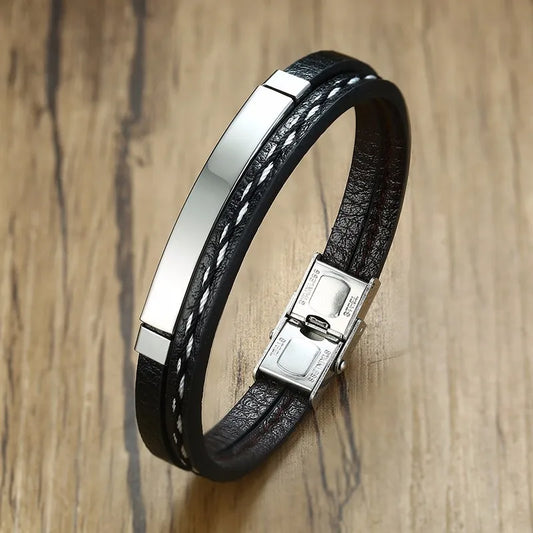 Bracelet en cuir véritable noir avec barre en acier inoxydable couleur argent, finition sobre et chic