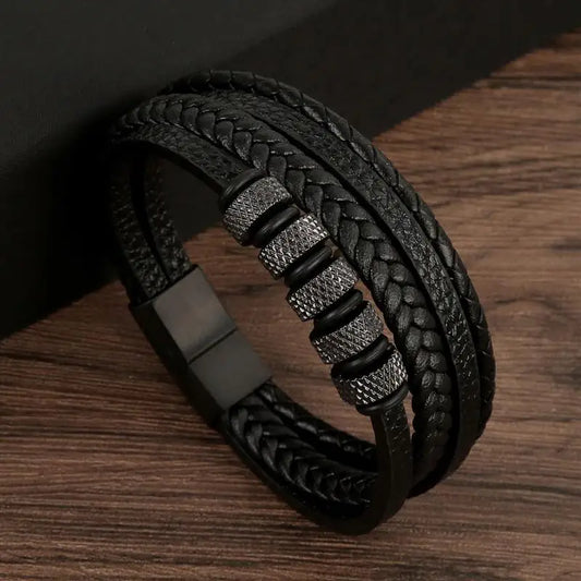 Bracelet moderne en cuir véritable noir, avec ornements métalliques minimalistes, accessoire de qualité
