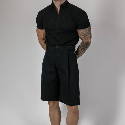 Polo noir côtelé en tricot texturé, style old money, élégant et confortable