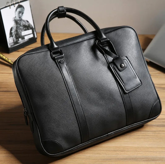 Sac en cuir noir pour homme, sac simple de 14 pouces, cuir de qualité. Rangements intérieurs pour une utilisation optimale. 