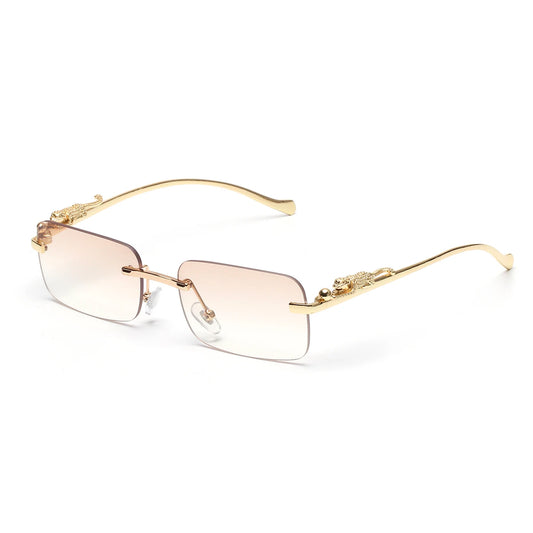 Lunettes de soleil SOLEMAR avec monture dorée et verres fumés marrons, look élégant et protection UV400